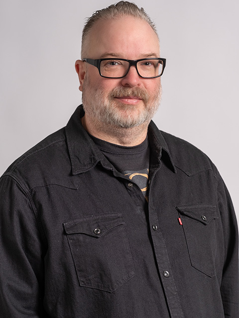 Portrait photograph of staff member, Craig Donnellon